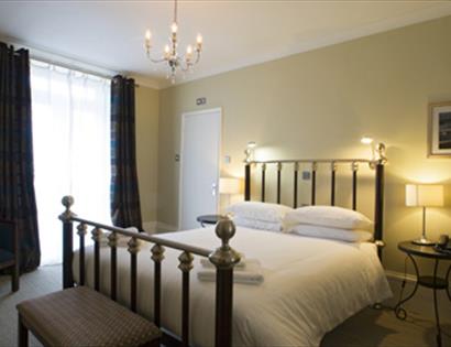 Bedroom at The White Rock Hotel